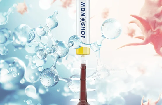 A Monoshot vial among blue bubbles